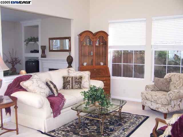 103 Pearlgrass Court San Ramon, CA 94582 - Photo 2 of 8 a living room with furniture and a large window