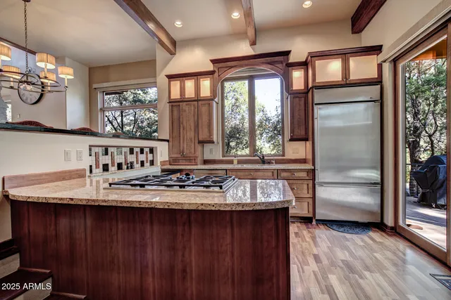 a bathroom with a double vanity sink and a window