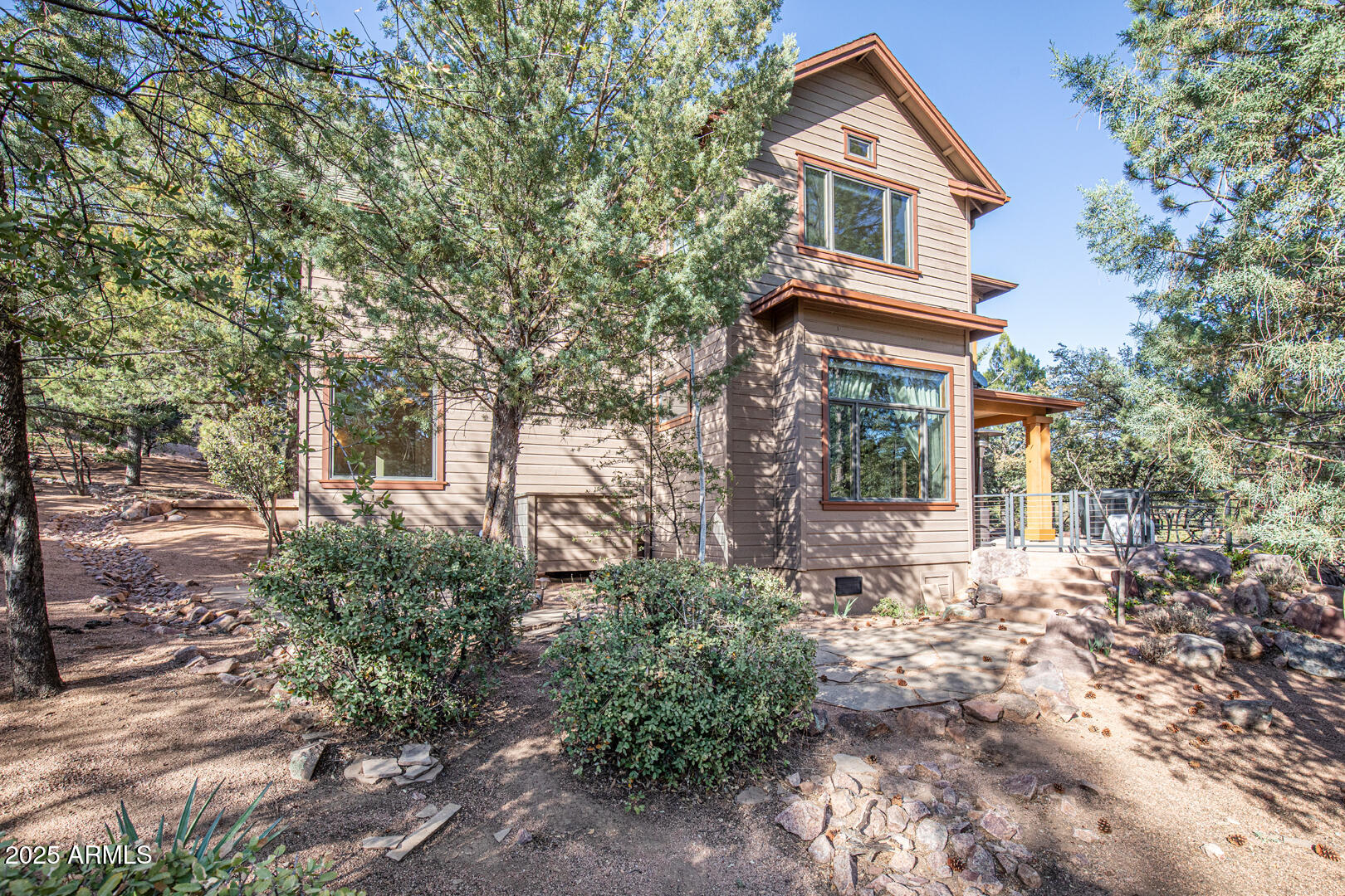 500 North Grapevine Drive Payson, AZ 85541 - Photo 20 of 55 a front view of a house with garden
