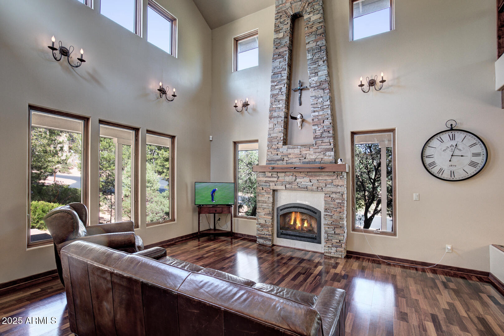500 North Grapevine Drive Payson, AZ 85541 - Photo 2 of 55 a living room with furniture a fireplace and a large window