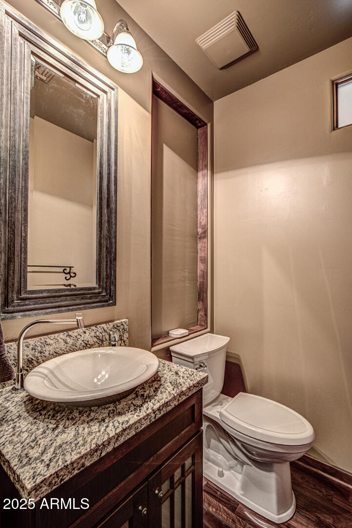 500 North Grapevine Drive Payson, AZ 85541 - Photo 21 of 55 a bathroom with a granite countertop sink and a mirror