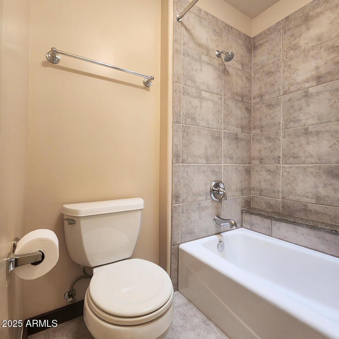 500 North Grapevine Drive Payson, AZ 85541 - Photo 29 of 55 a bathroom with a toilet and a shower