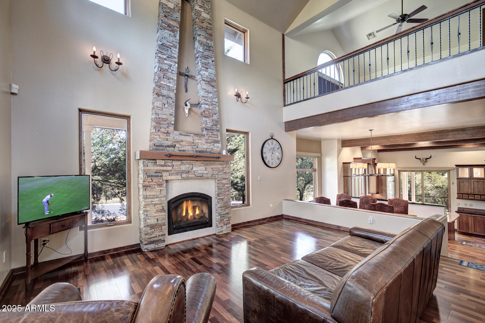 500 North Grapevine Drive Payson, AZ 85541 - Photo 3 of 55 a living room with furniture a fireplace and a flat screen tv
