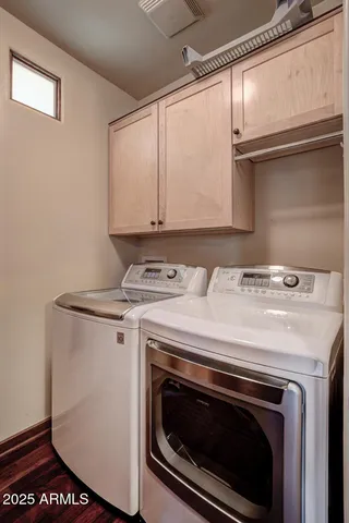 an aerial view of a residential houses with outdoor space