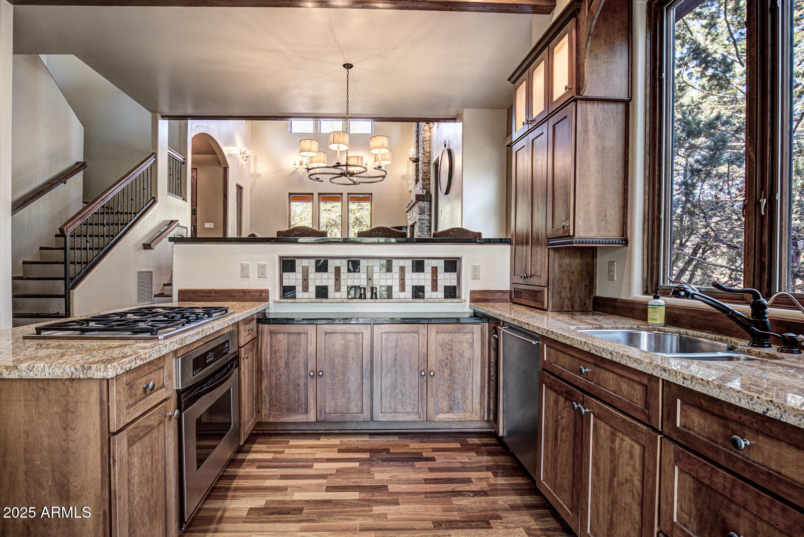 500 North Grapevine Drive Payson, AZ 85541 - Photo 6 of 55 a kitchen with stainless steel appliances granite countertop a stove and a sink
