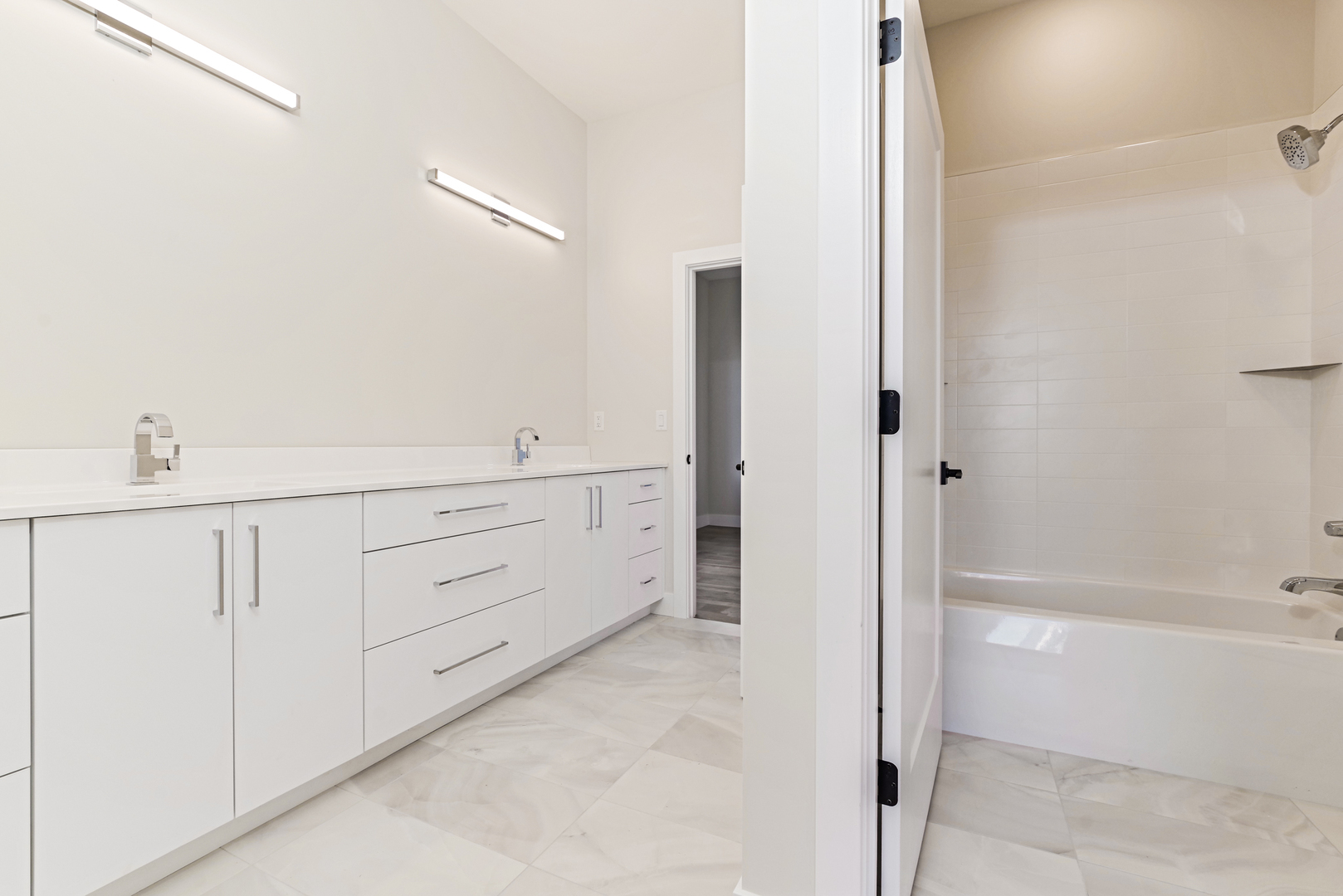 1252 Silver Oak Circle Normal, IL 61761 - Photo 25 of 46 a bathroom with a bathtub and a shower