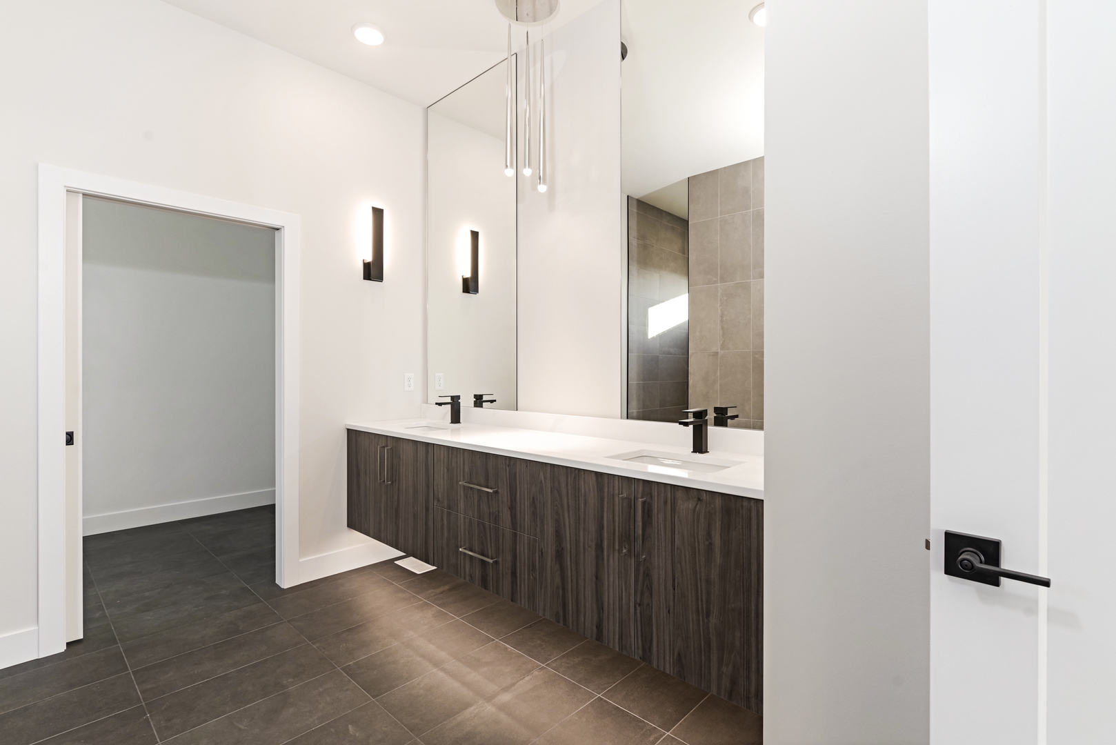 1252 Silver Oak Circle Normal, IL 61761 - Photo 28 of 46 a bathroom with a double vanity sink mirror and double