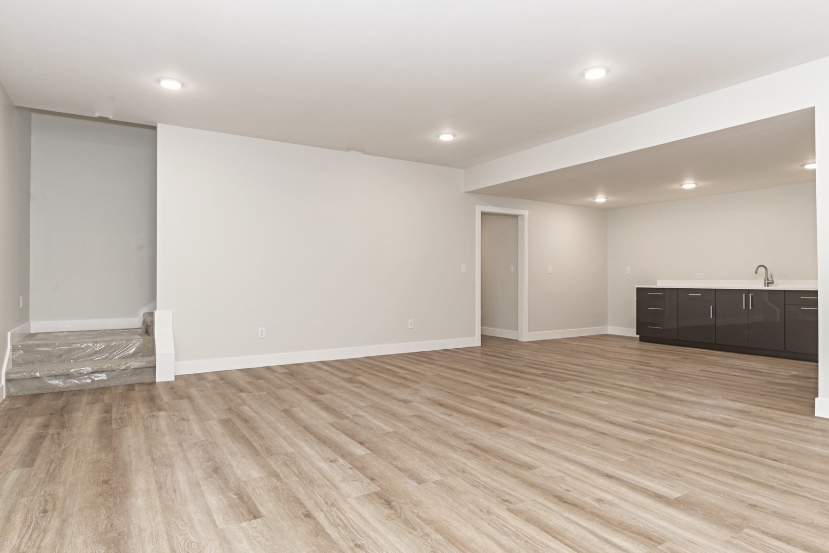 1252 Silver Oak Circle Normal, IL 61761 - Photo 36 of 46 a view of an empty room with wooden floor and a window