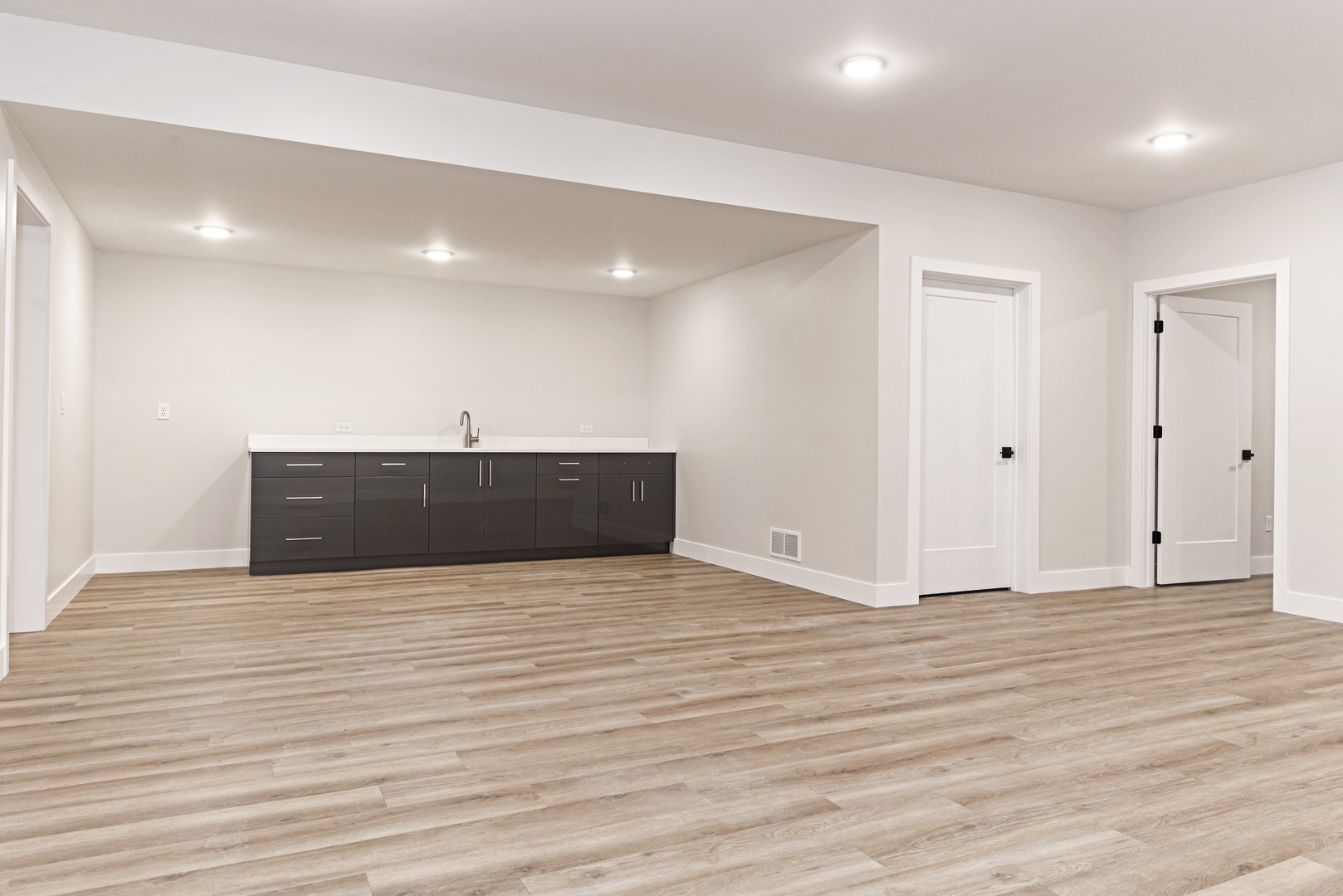 1252 Silver Oak Circle Normal, IL 61761 - Photo 37 of 46 a view of an empty room with wooden floor