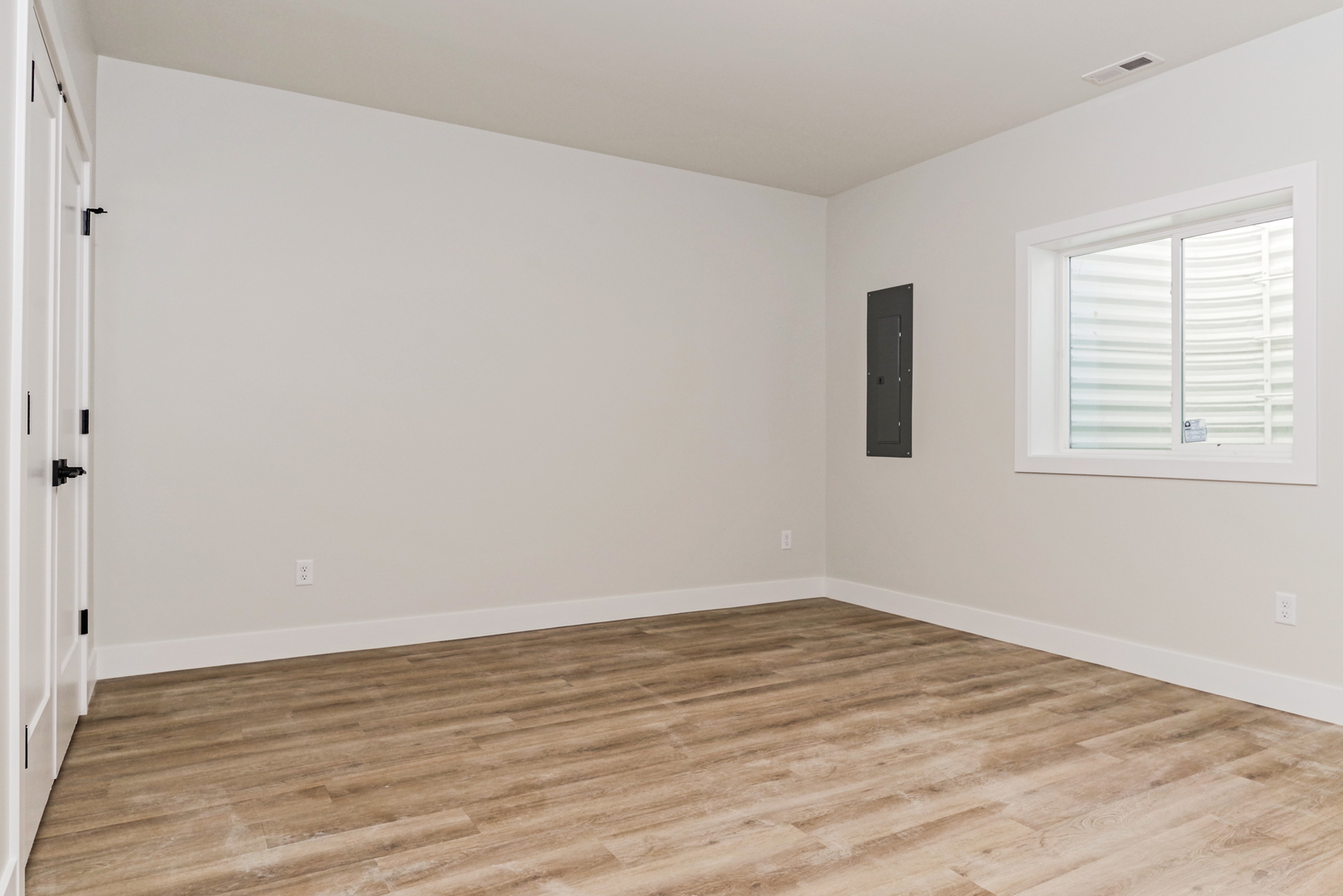 1252 Silver Oak Circle Normal, IL 61761 - Photo 39 of 46 wooden floor in an empty room with a window