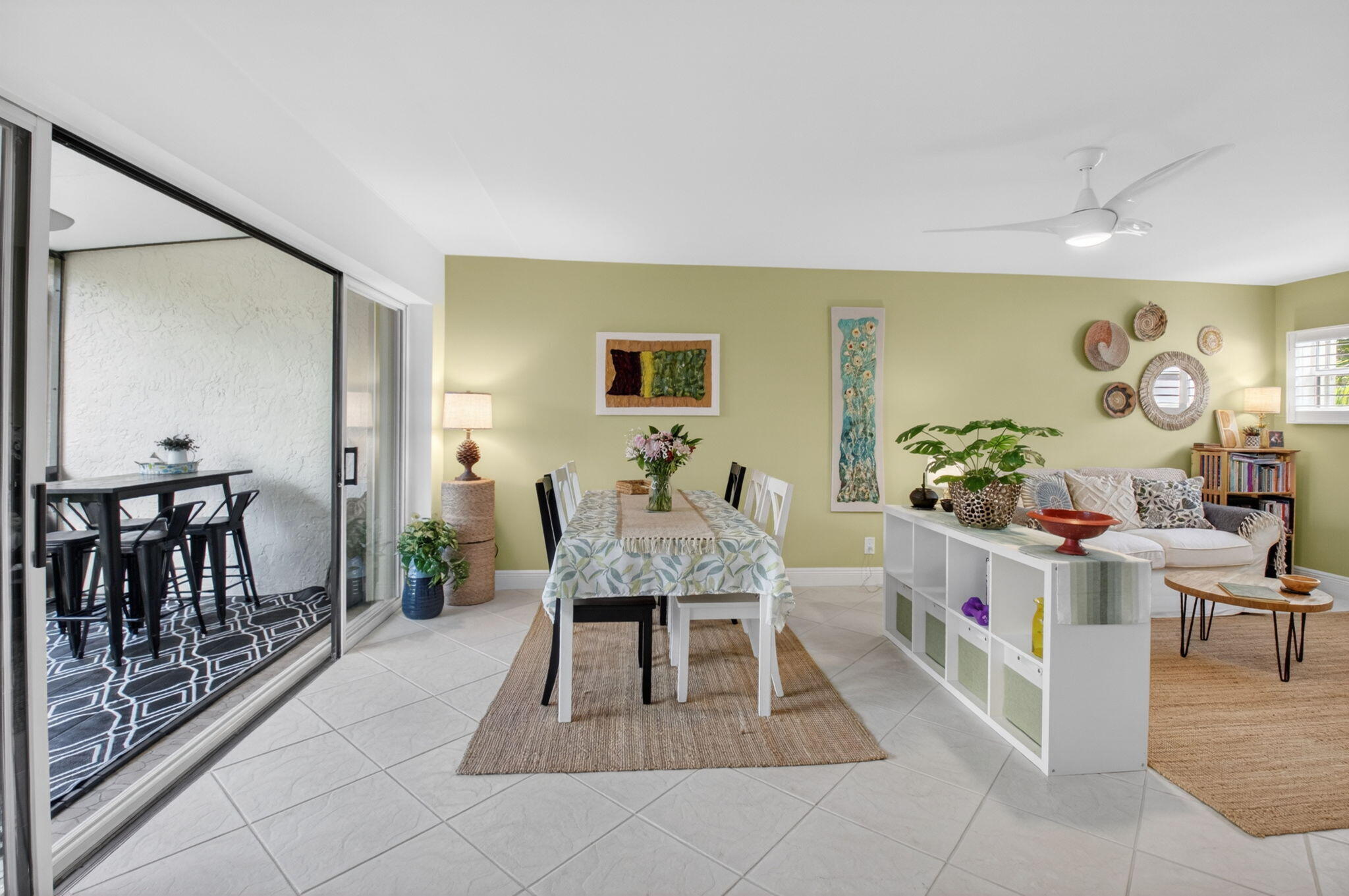 149 Northwest 70th Street, Unit 106C Boca Raton, FL 33487 - Photo 11 of 41 a living room with furniture and wooden floor