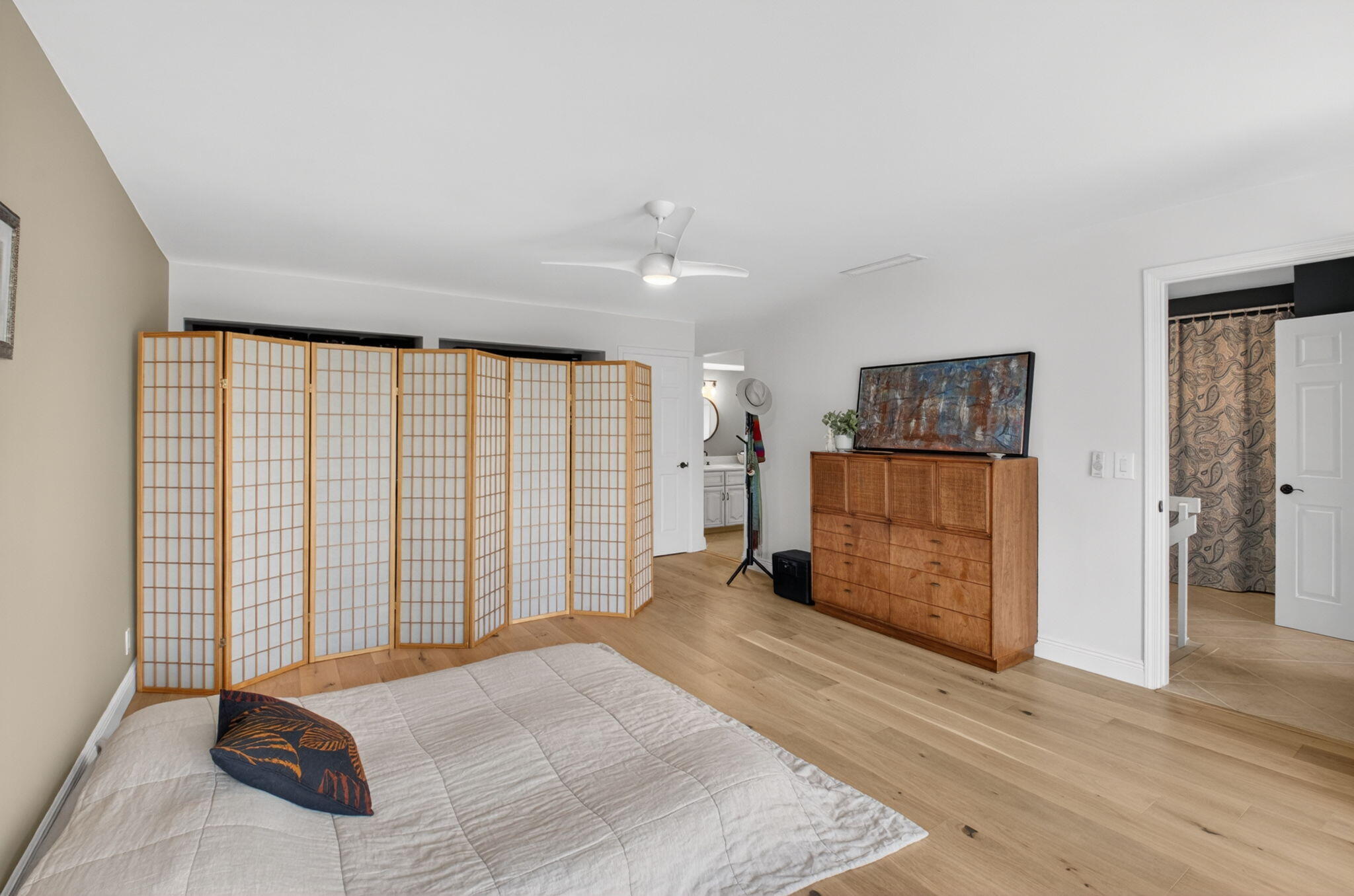 149 Northwest 70th Street, Unit 106C Boca Raton, FL 33487 - Photo 20 of 41 a view of a livingroom with wooden floor and a window