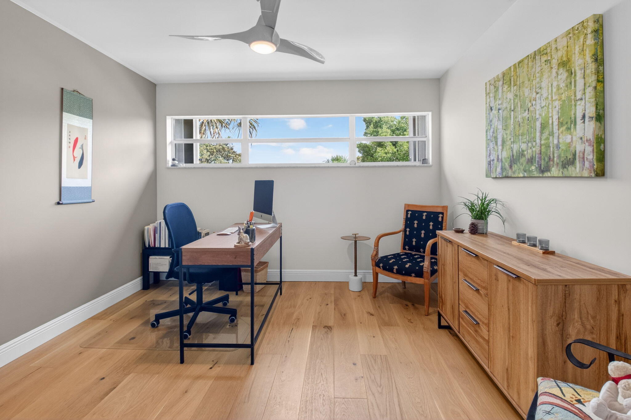 149 Northwest 70th Street, Unit 106C Boca Raton, FL 33487 - Photo 30 of 41 a dining room with wooden floor and a window
