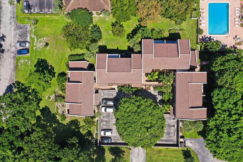 149 Northwest 70th Street, Unit 106C Boca Raton, FL 33487 - Photo 34 of 41 an aerial view of a house with garden space and a street view