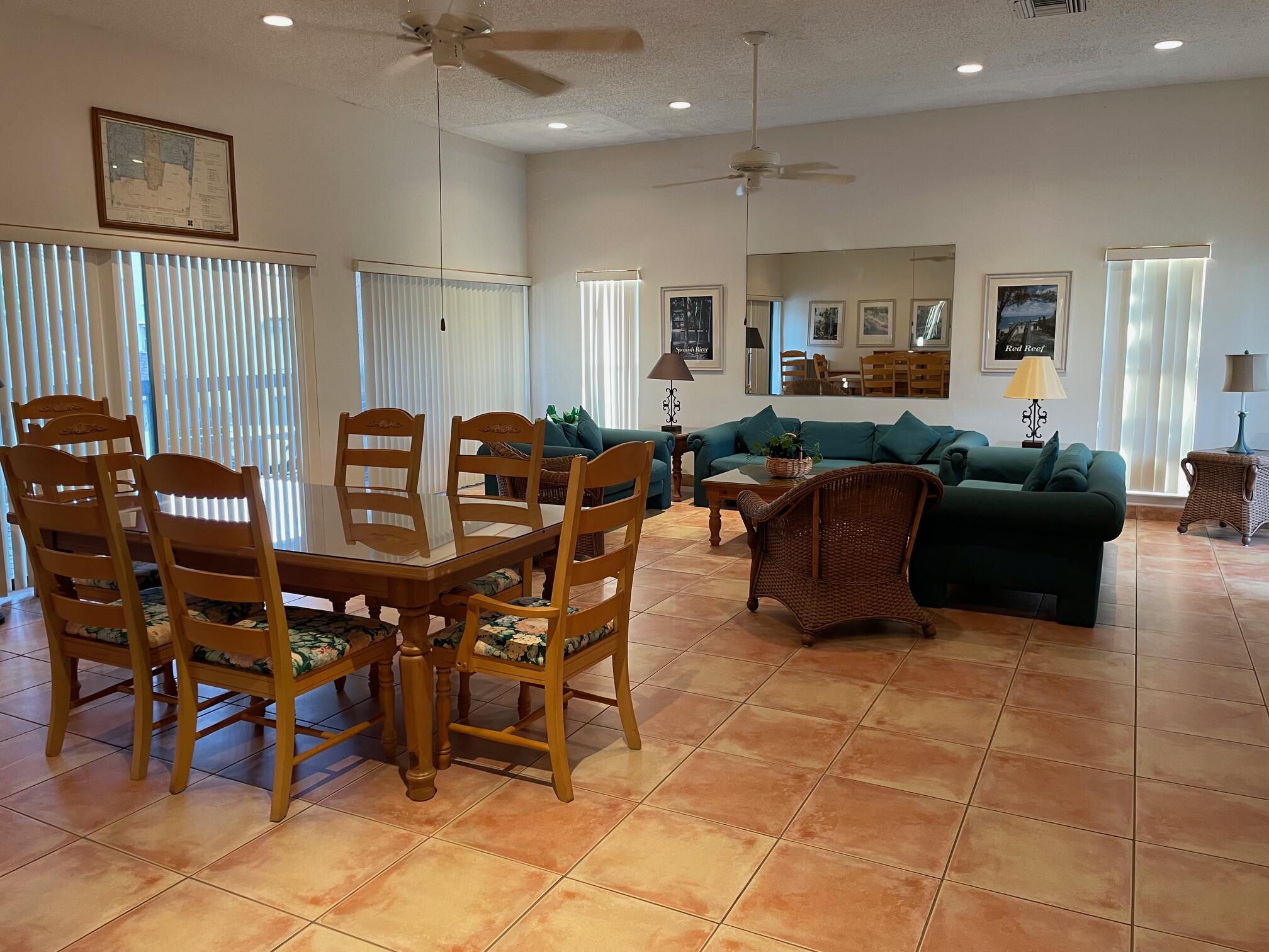 149 Northwest 70th Street, Unit 106C Boca Raton, FL 33487 - Photo 41 of 41 a view of a dining room with furniture