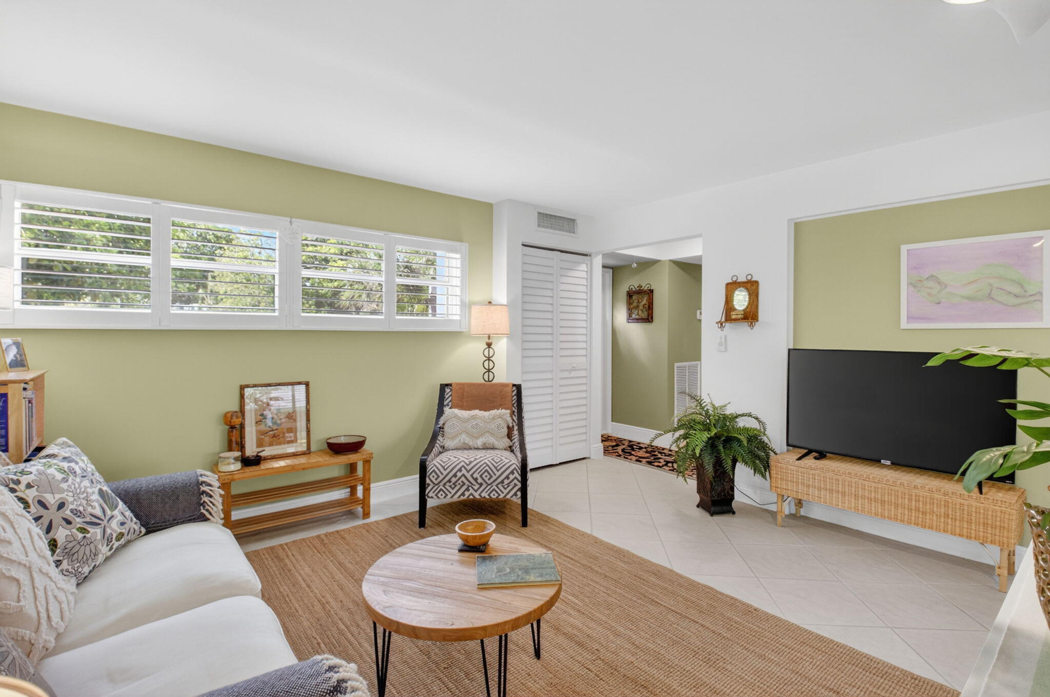 149 Northwest 70th Street, Unit 106C Boca Raton, FL 33487 - Photo 8 of 41 a living room with furniture