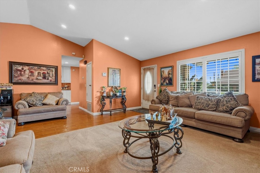 506 South Althea Avenue Rialto, CA 92376 - Photo 17 of 36 a living room with furniture and a large window