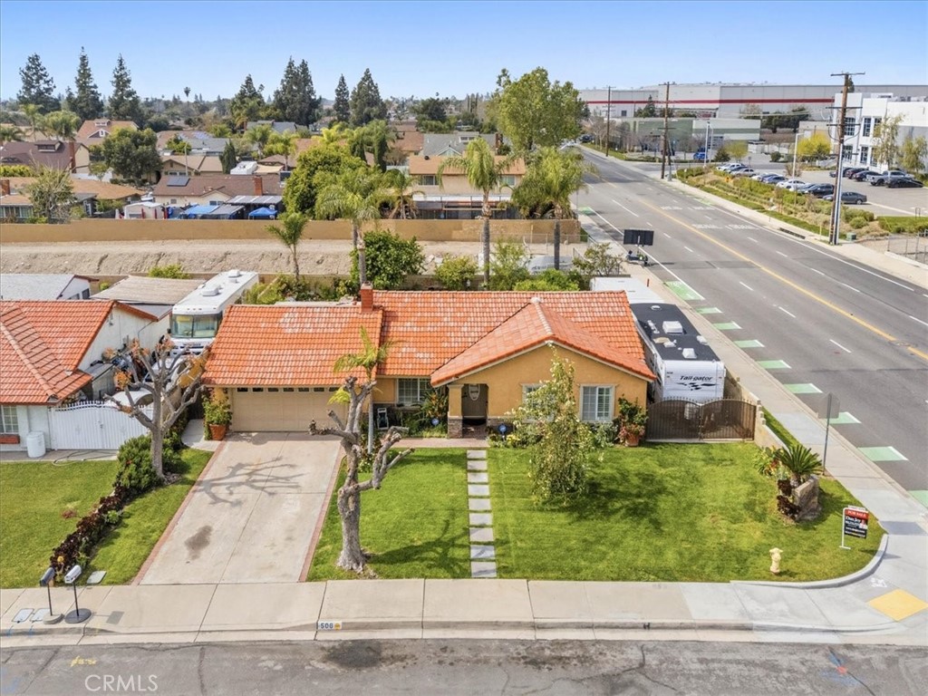 506 South Althea Avenue Rialto, CA 92376 - Photo 34 of 36 an aerial view of residential houses with outdoor space and river