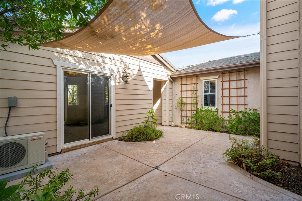 28817 Edenton Way Temecula, CA 92591 - Photo 11 of 56 a front view of a house with garden