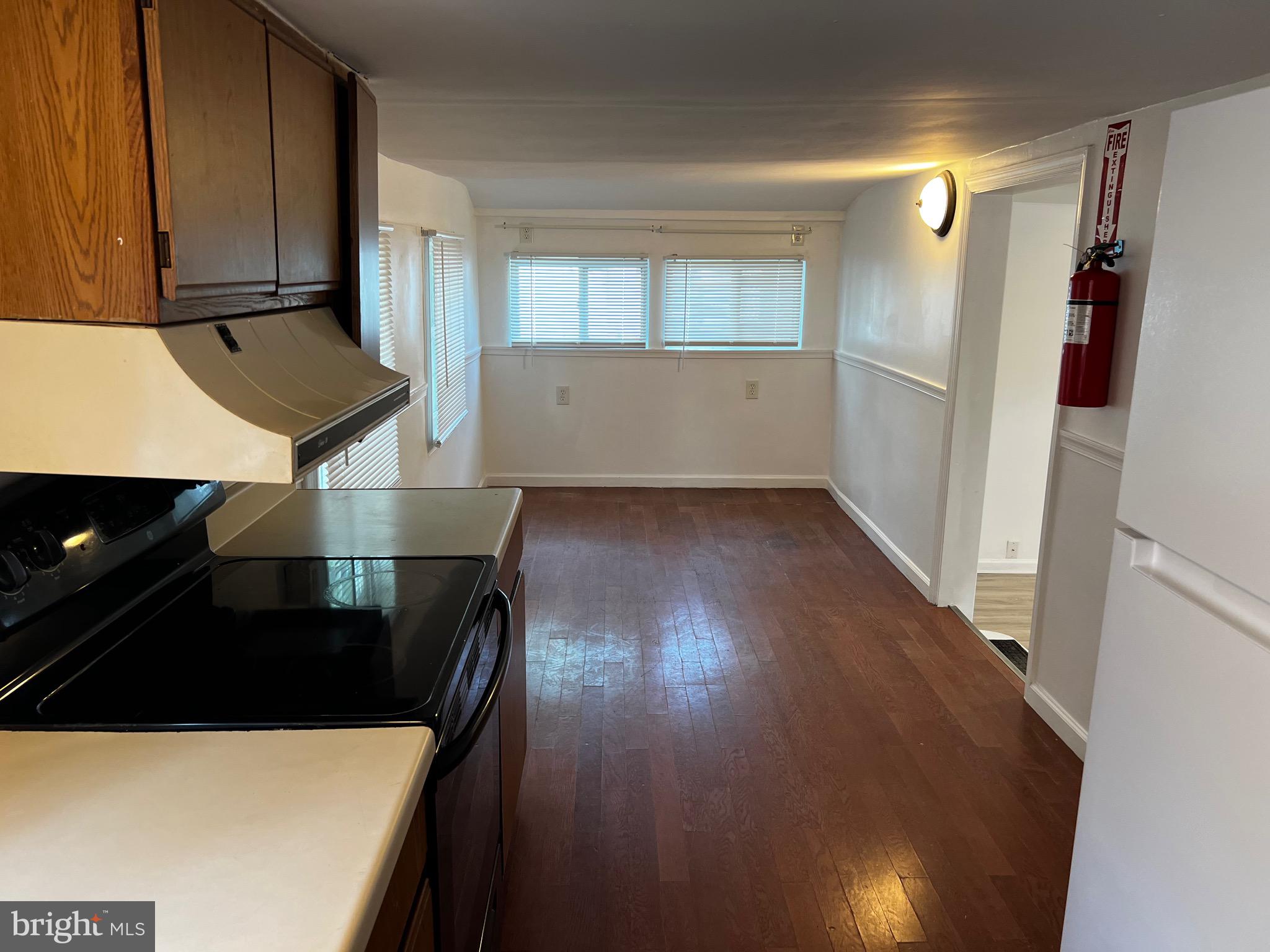 484 Harrison Avenue Mantua, NJ 08051 - Photo 10 of 14 a view of an empty room and wooden floor