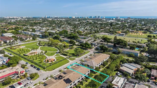 an aerial view of residential building and city view
