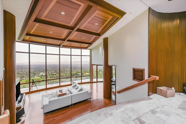 a large living room with a large window
