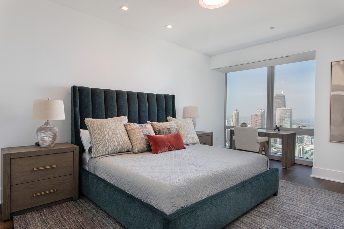 363 East Wacker Drive, Unit 5505 Chicago, IL 60601 - Photo 7 of 26 a bedroom with a bed and large window