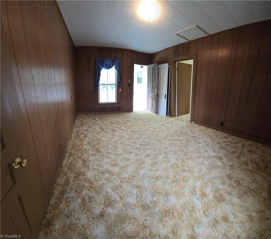 1560 Gentry Farm Road King, NC 27021 - Photo 25 of 49 A bonus room that opens to the upper level back porch