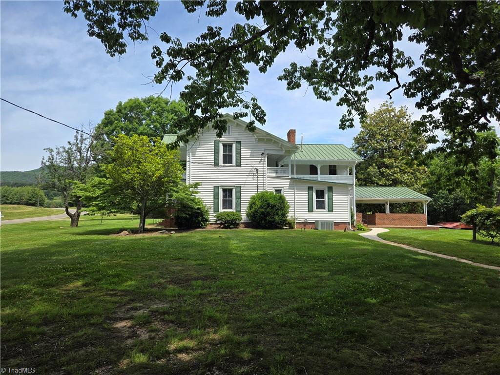 1560 Gentry Farm Road King, NC 27021 - Photo 3 of 49 Side view of home