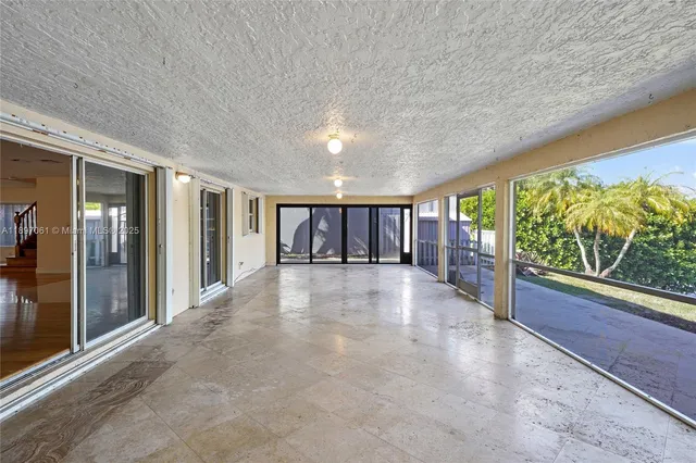 a view of a backyard of the house