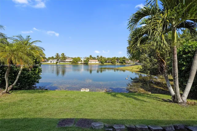 a picture of a bathroom with a shower