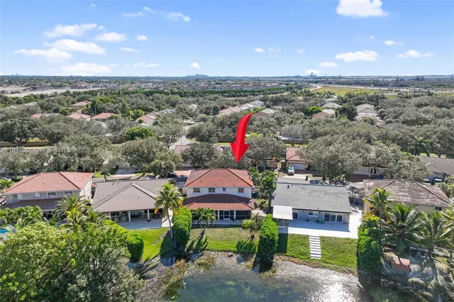 a front view of a house with parking space