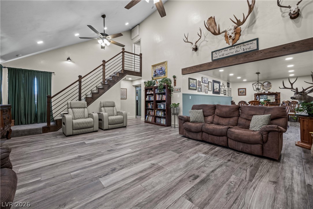 750 Leming Avenue Overton, NV 89040 - Photo 11 of 82 This expansive living room features vaulted ceilings, rich hardwood flooring, and an elegant staircase.