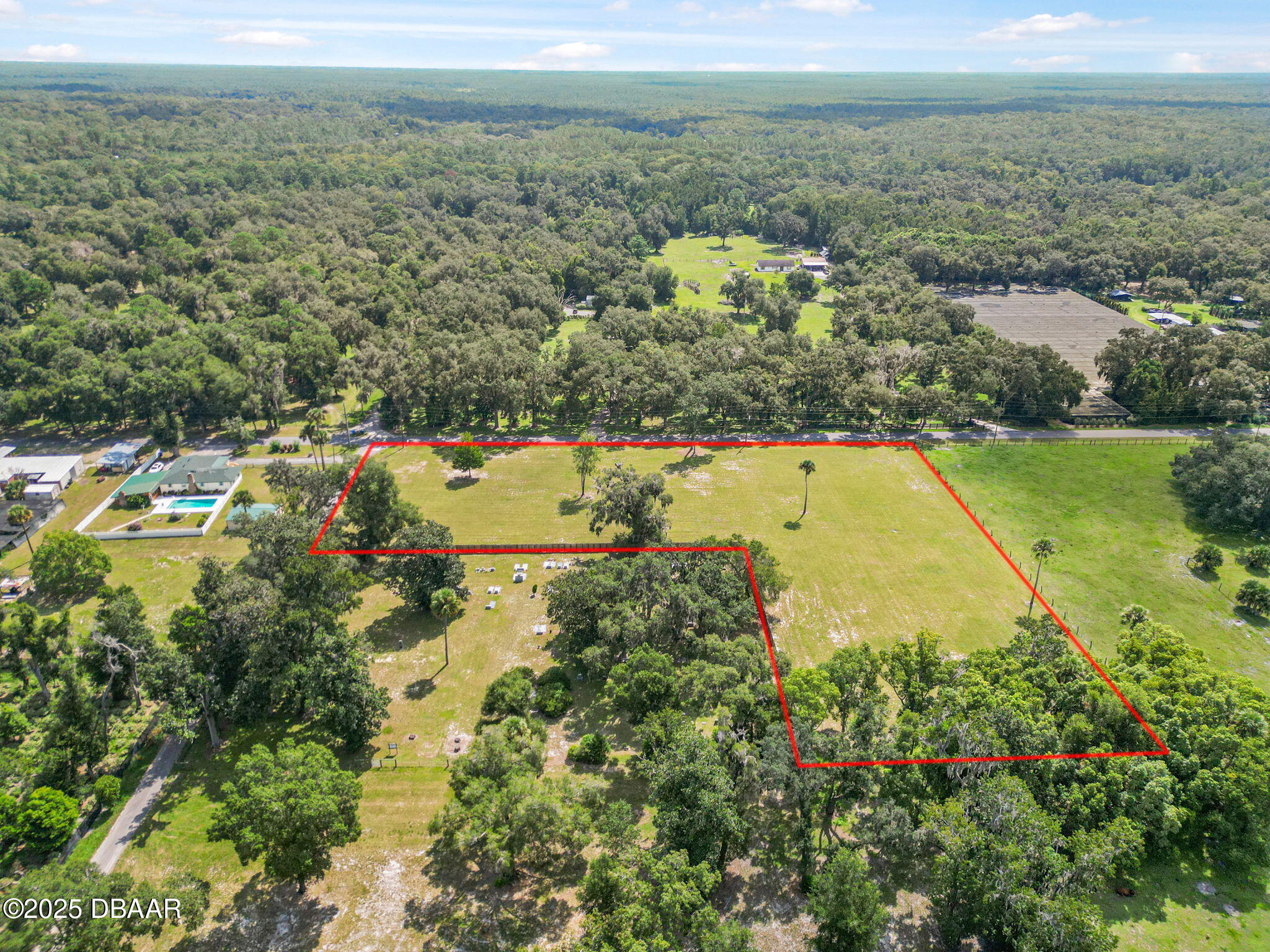 1340 Church Street Pierson, FL 32180 - Photo 7 of 13 an aerial view of residential houses with outdoor space and trees