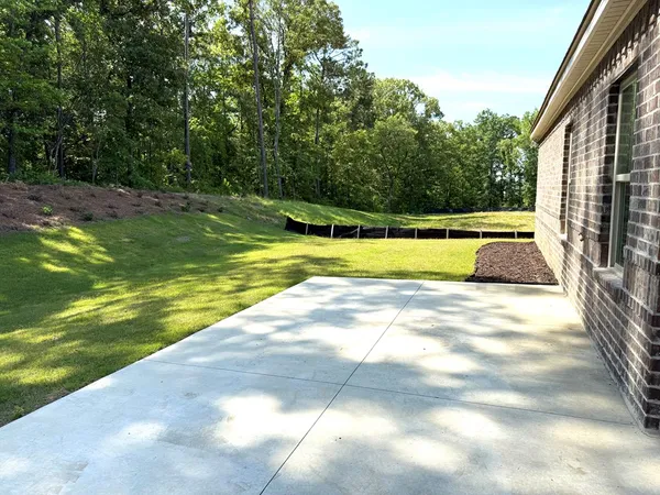 a house view with a outdoor space