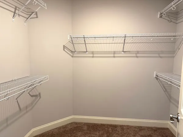 a view of a room with racks on the wall