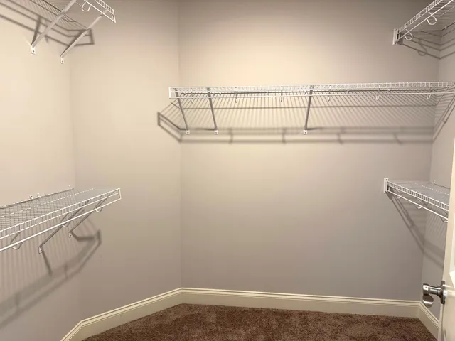 a view of a room with racks on the wall