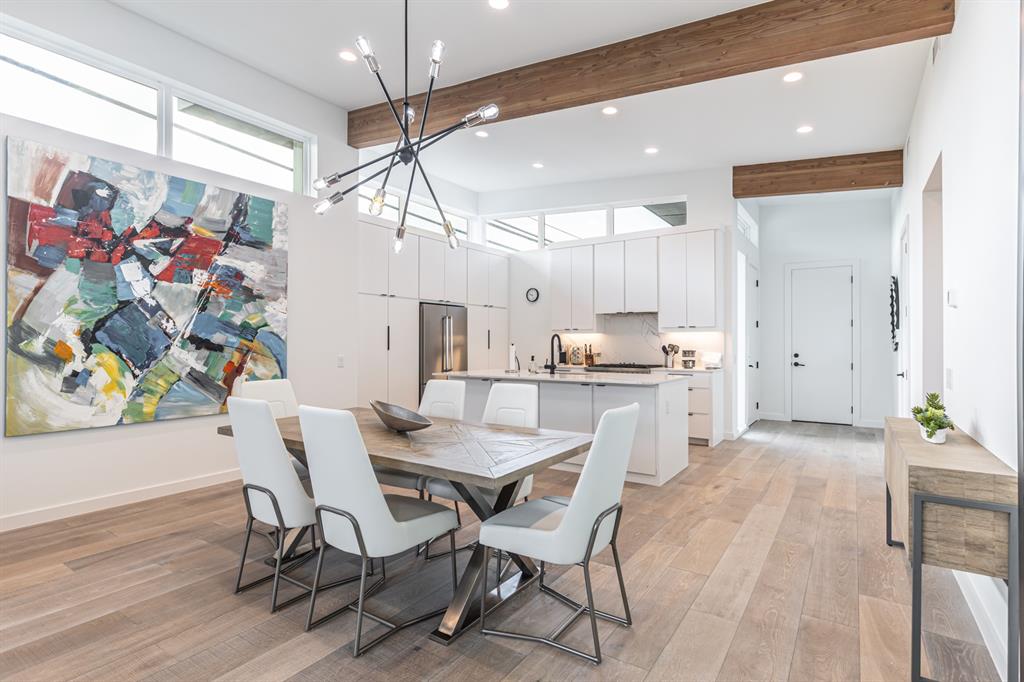 4202 Bonham Street Dallas, TX 75229 - Photo 11 of 32 Dining area with recessed lighting, beam ceiling, and light wood-type flooring