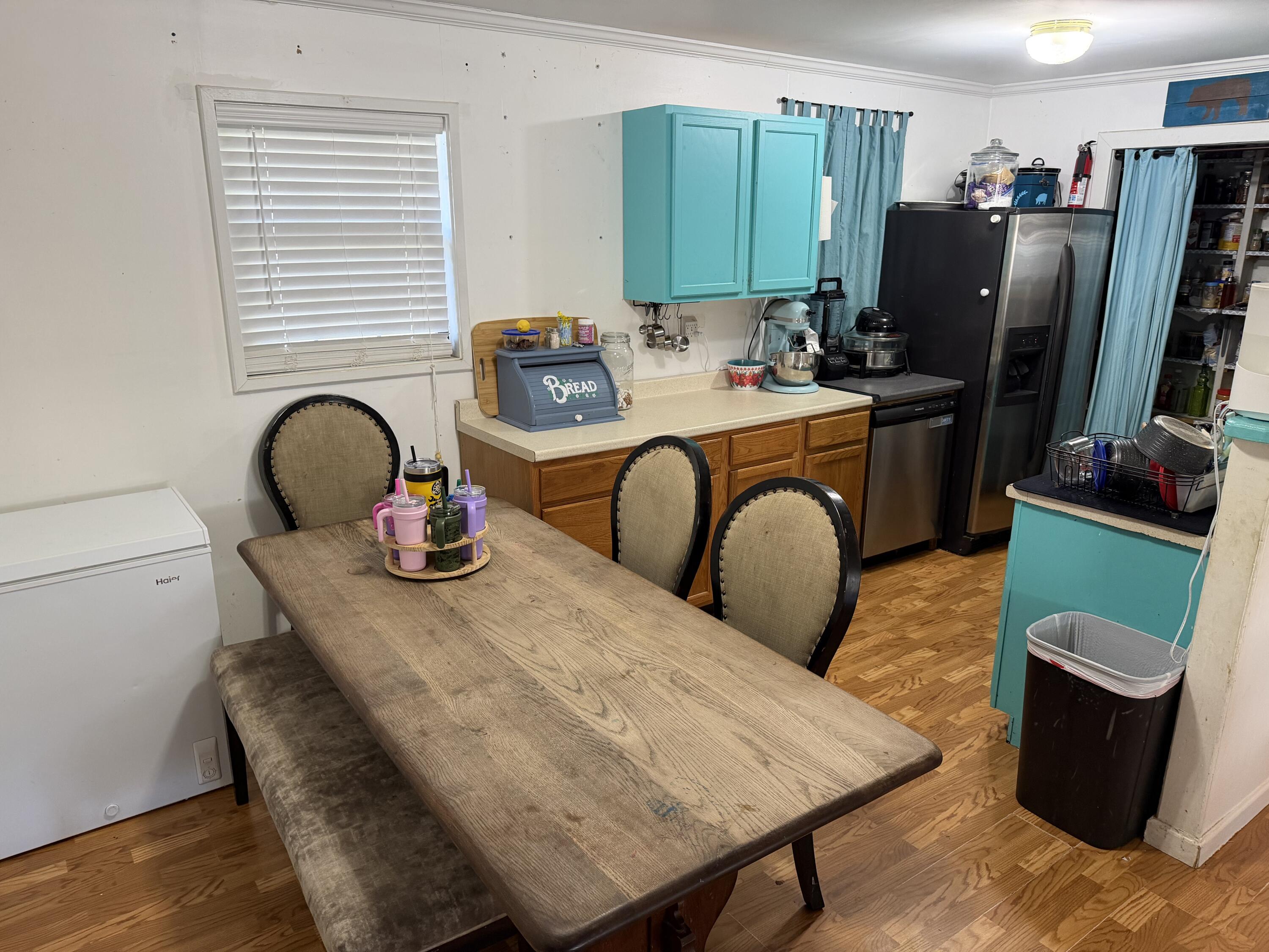 5875 Oak Hill Road Crestview, FL 32536 - Photo 14 of 43 a dining room with furniture