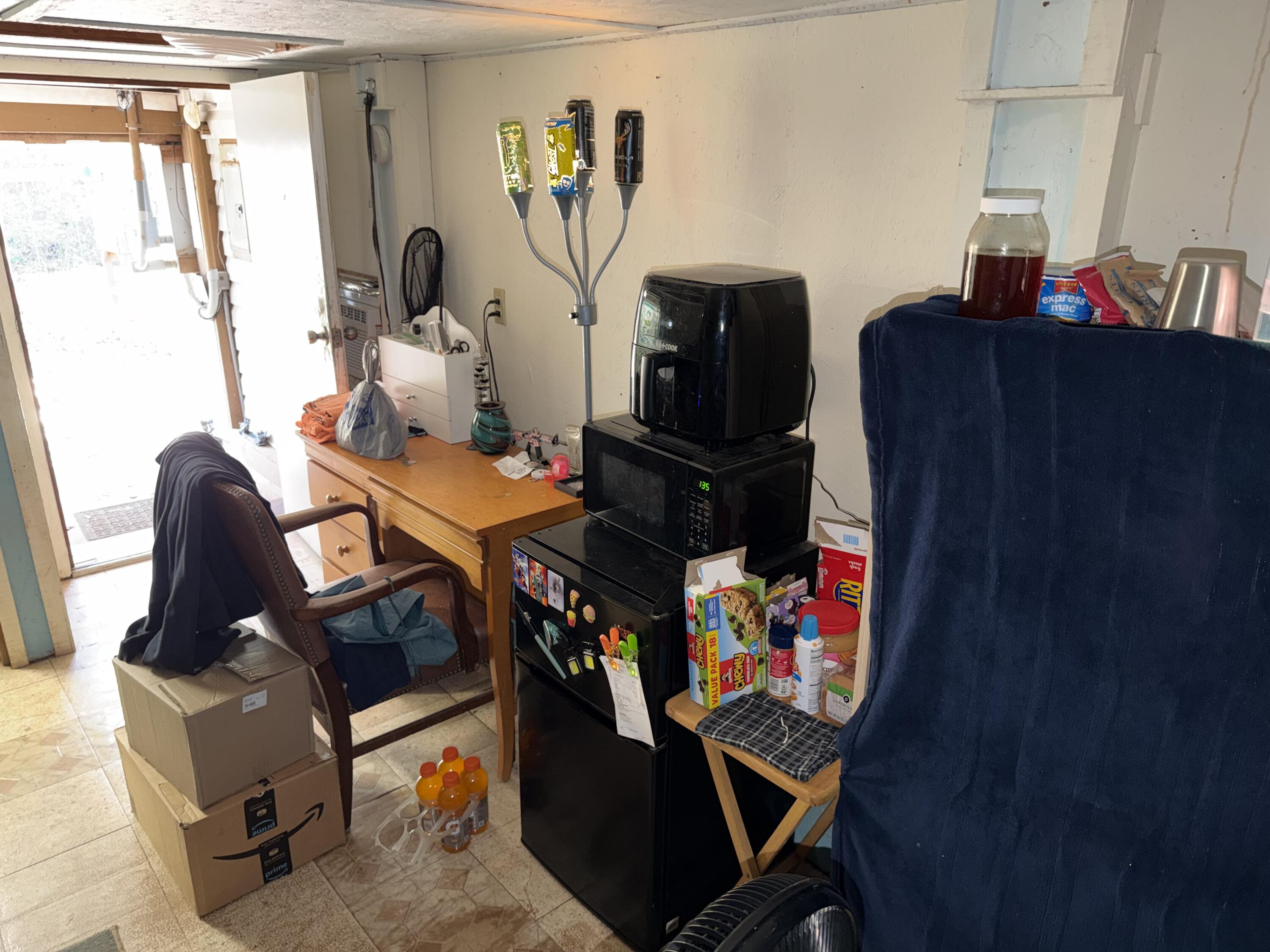 5875 Oak Hill Road Crestview, FL 32536 - Photo 39 of 43 a living room with furniture and a window
