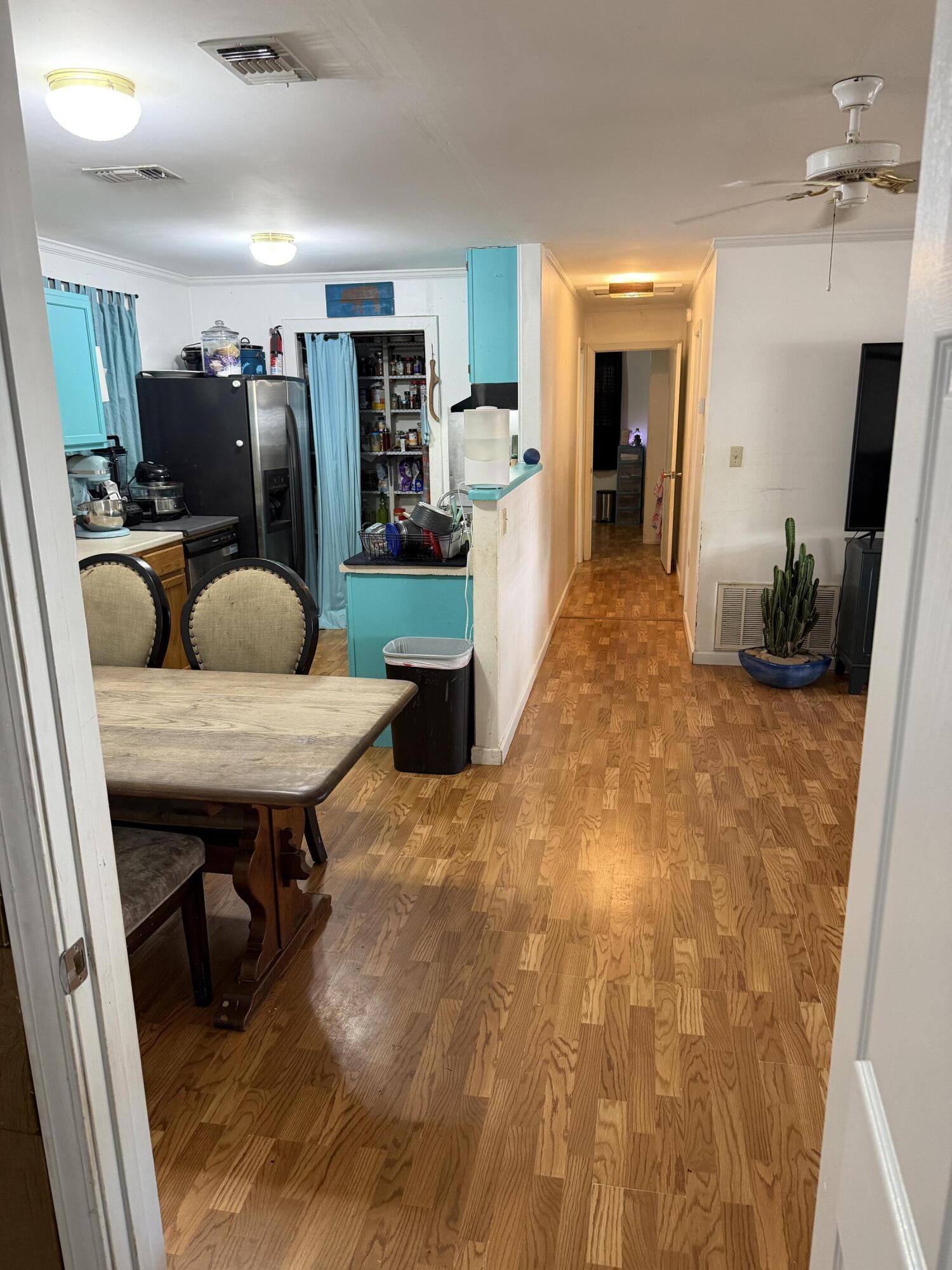 5875 Oak Hill Road Crestview, FL 32536 - Photo 10 of 43 a living room with furniture and a flat screen tv