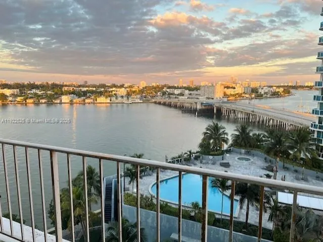 a view of a lake from a balcony