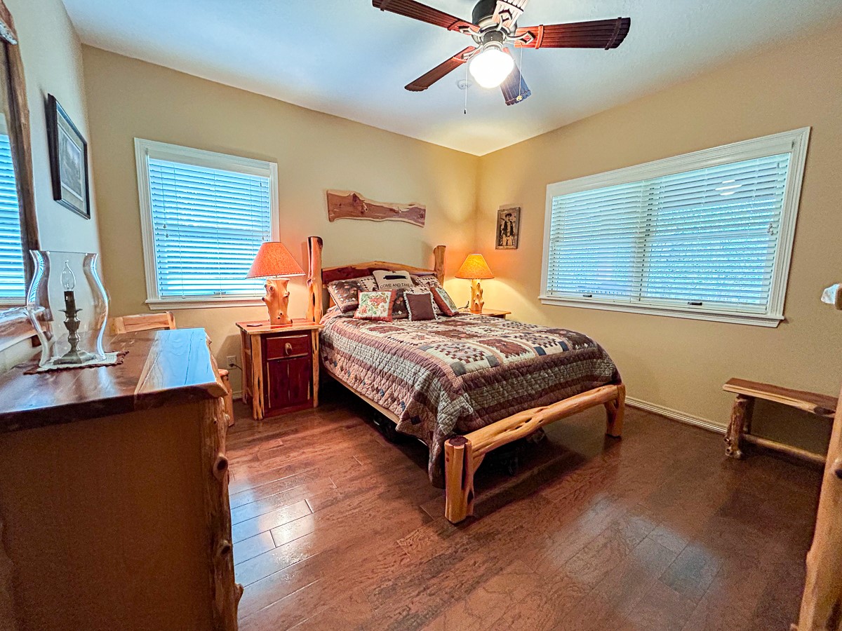 5259 Farm To Market 946 Coldspring, TX 77331 - Photo 12 of 39 a bedroom with a bed and window