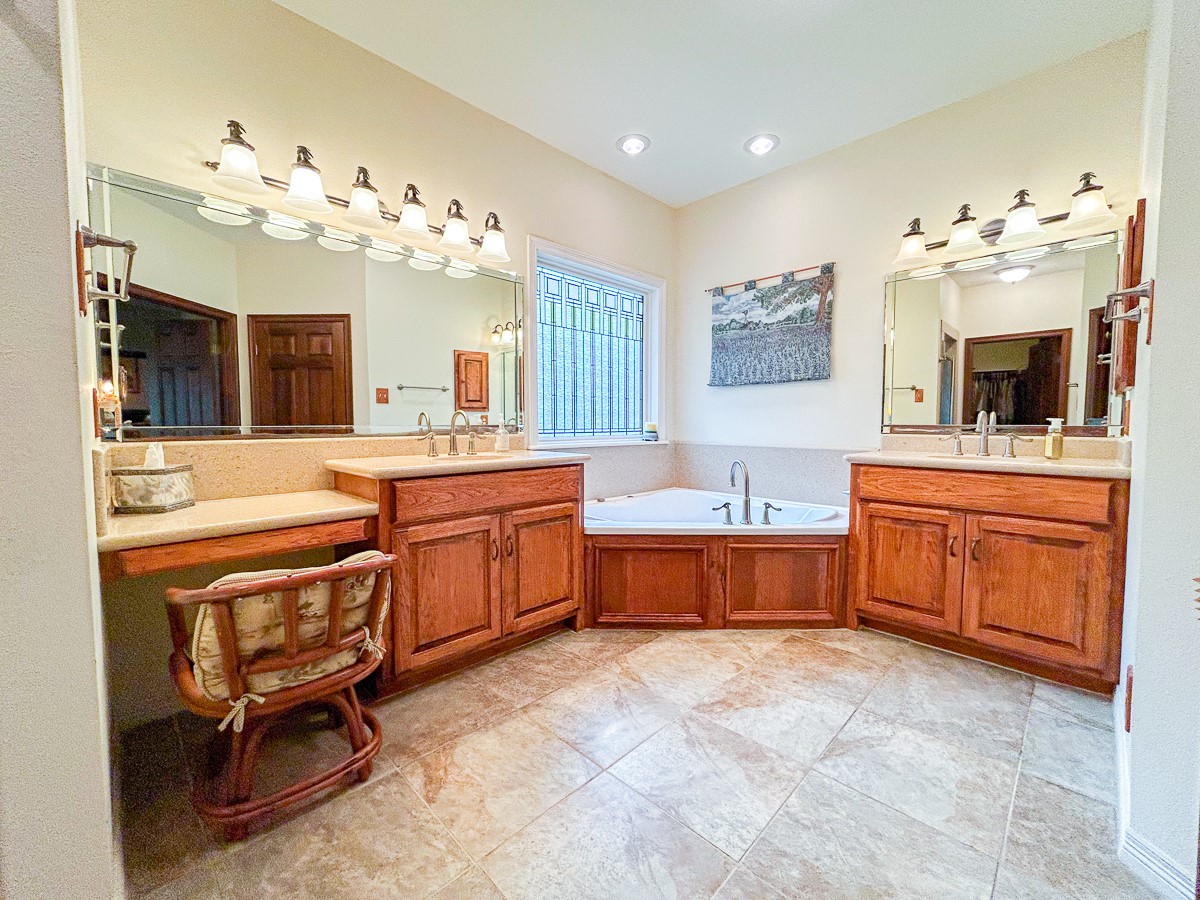 5259 Farm To Market 946 Coldspring, TX 77331 - Photo 16 of 39 a large kitchen with a stove a sink dishwasher a dining table and chairs with wooden floor