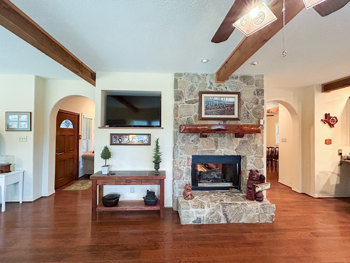 5259 Farm To Market 946 Coldspring, TX 77331 - Photo 20 of 39 a living room with furniture and a fireplace