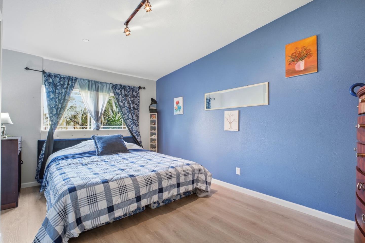 36985 Walnut Street Newark, CA 94560 - Photo 17 of 30 a bedroom with a bed and a window