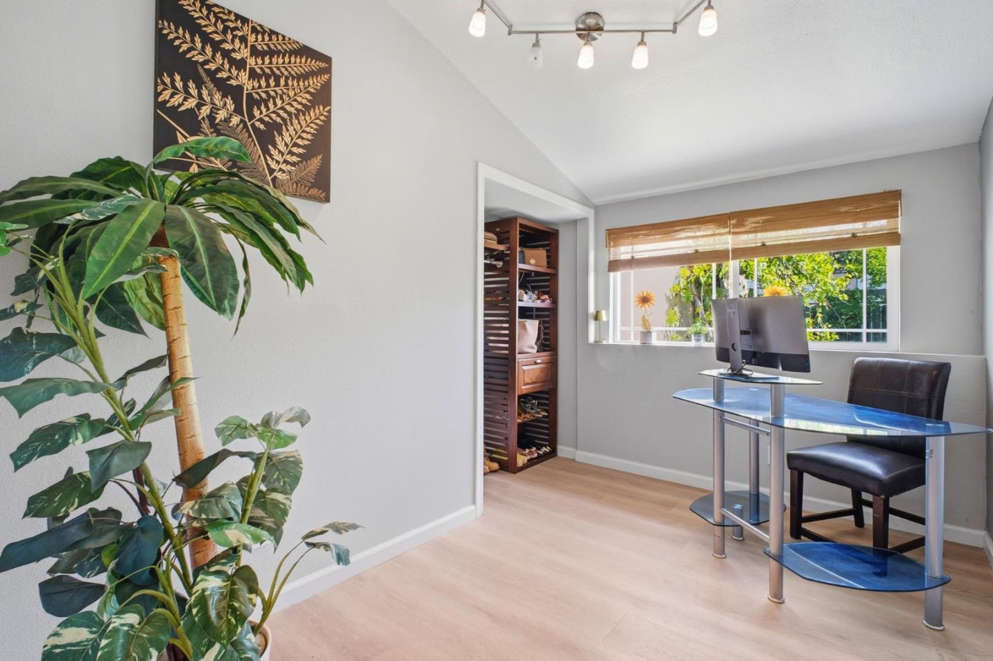 36985 Walnut Street Newark, CA 94560 - Photo 18 of 30 a workspace with furniture and a potted plant