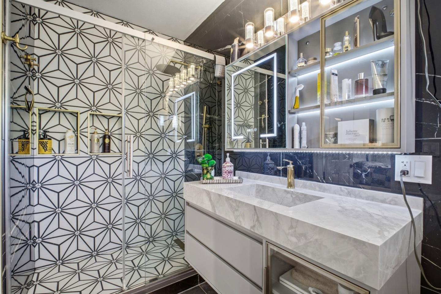 36985 Walnut Street Newark, CA 94560 - Photo 22 of 30 a bathroom with a sink and a mirror
