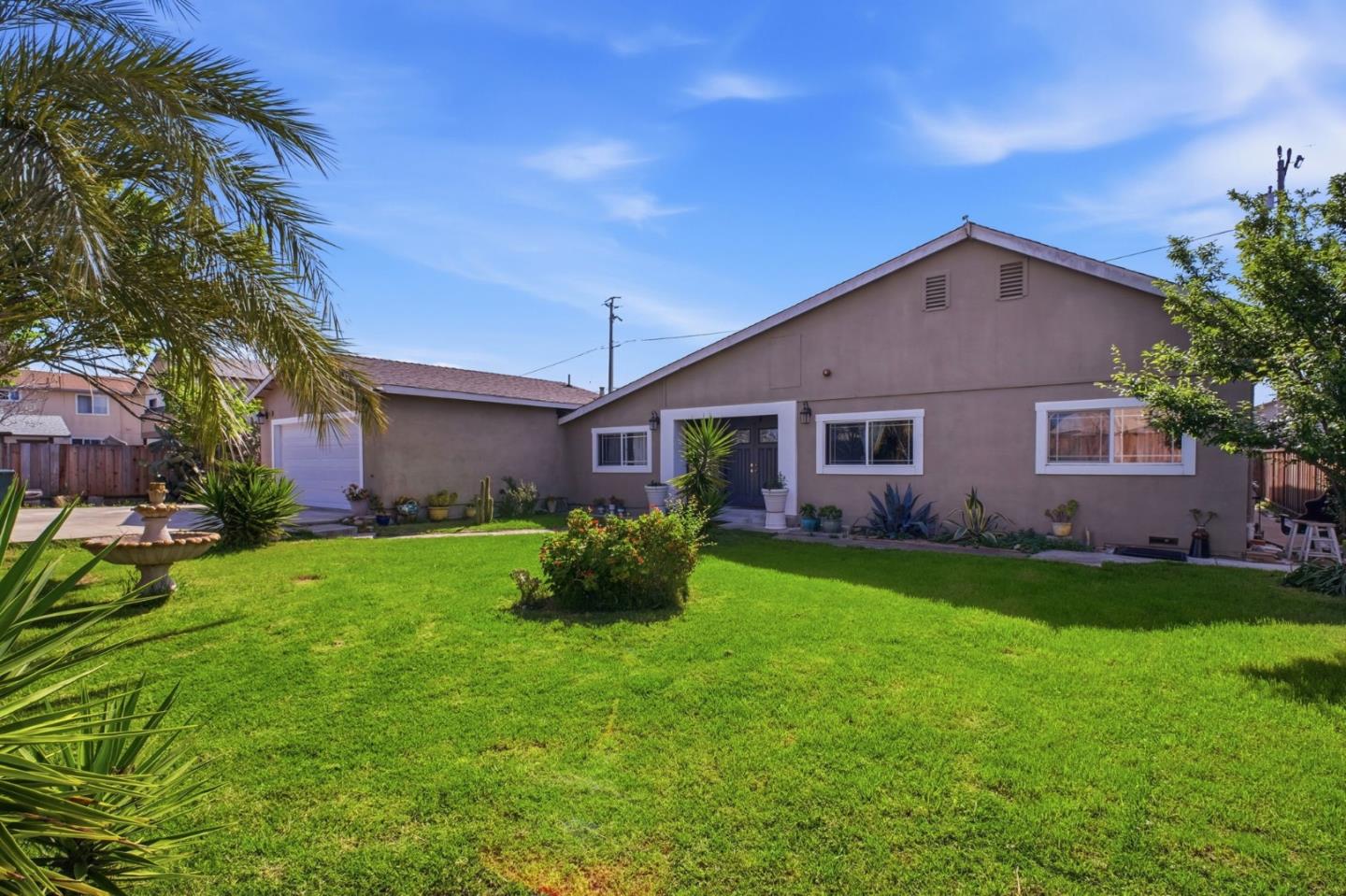 36985 Walnut Street Newark, CA 94560 - Photo 3 of 30 a view of a yard in front of a house with green space