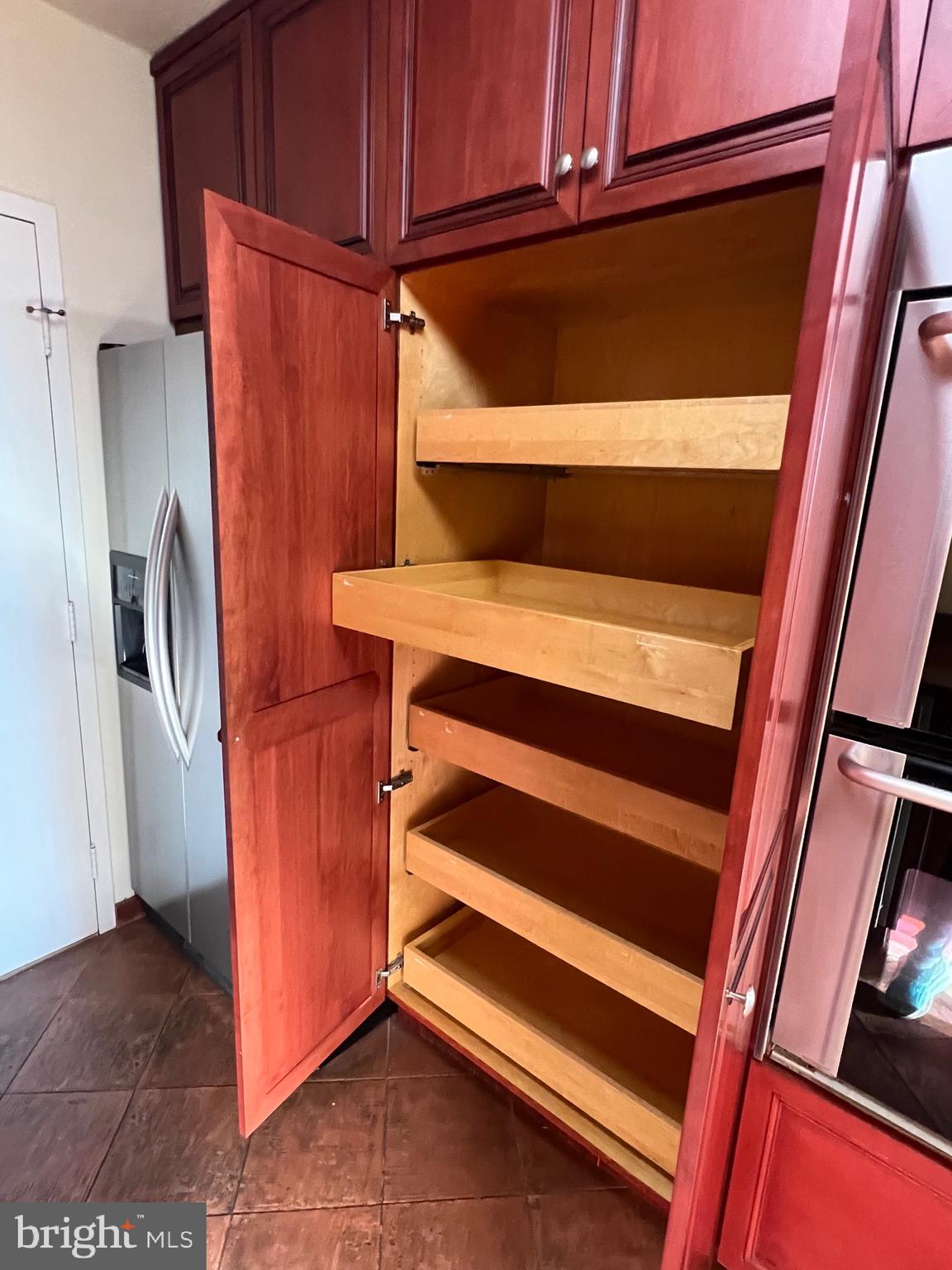 4401 Roland Avenue, Unit 402 Baltimore, MD 21210 - Photo 21 of 43 a view of walk in closet with empty racks